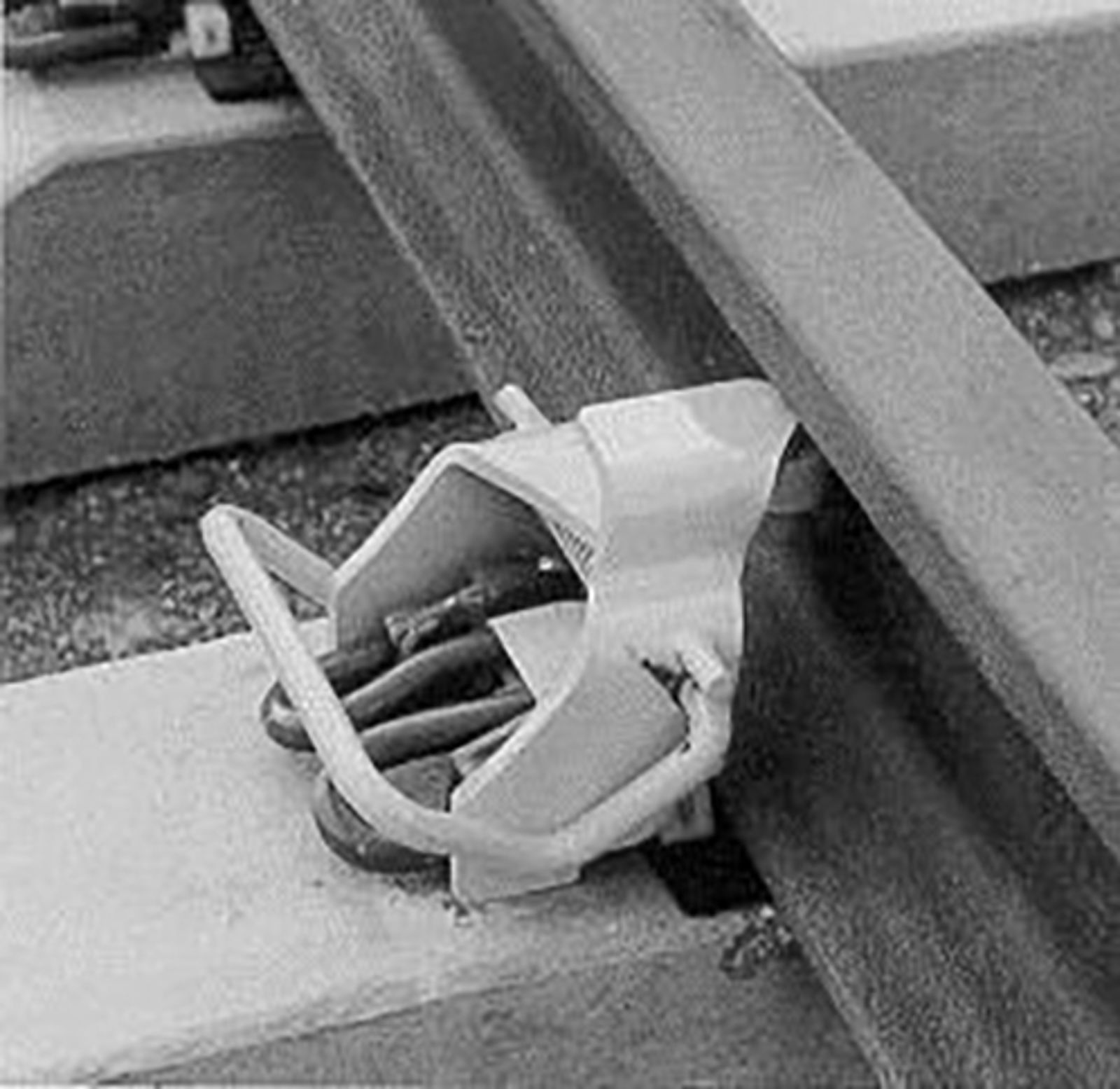 Sidestøtterull montert på skinne for stabilisering i kurver.