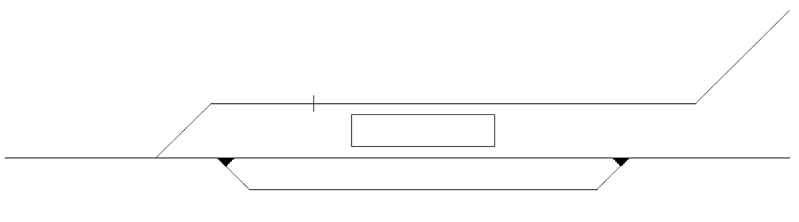 Tilslutningsstasjon der en sidebane kobles til hovedbanen, med separat plattform for omstigning.